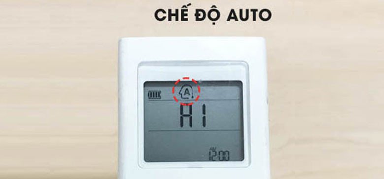 Biểu tượng chế độ AUTO hình mũi tên xoay vòng