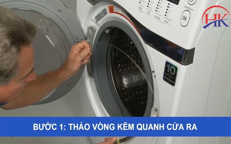 Tháo vòng kẽm quanh cửa máy giặt để thay công tắc